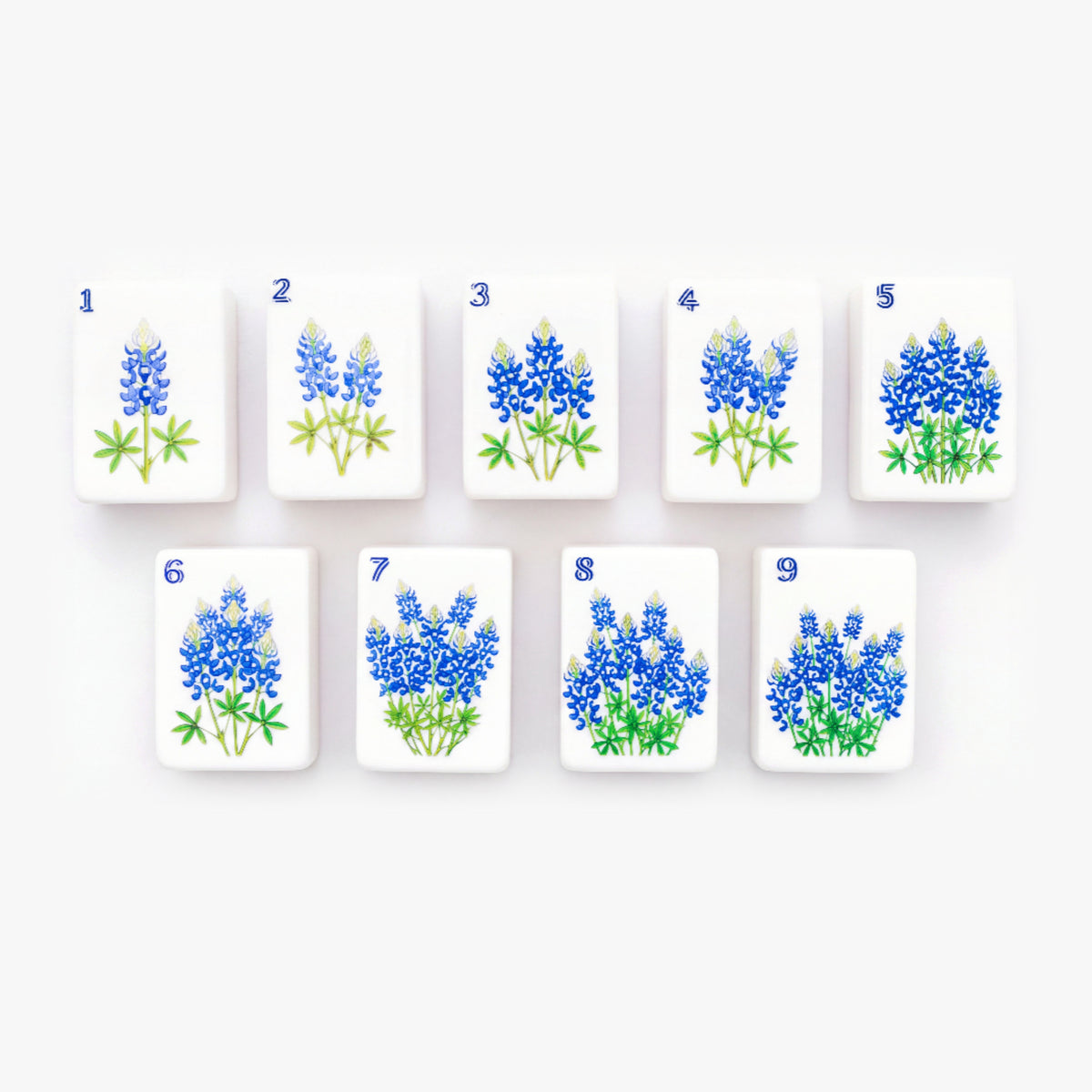 Bluebonnet suit tiles 1 through 9 from The Dallas Collective, each illustrated with Texas bluebonnets