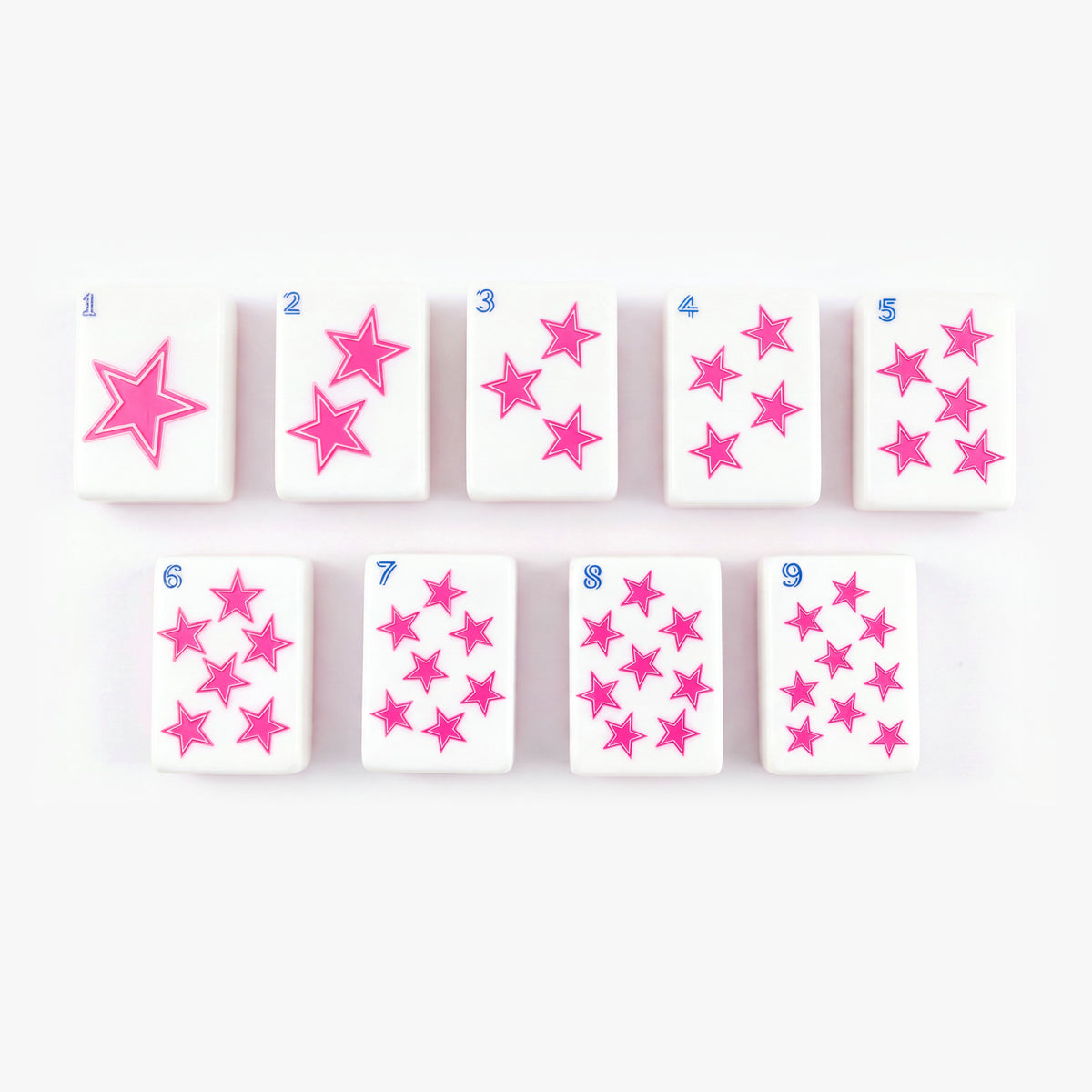Star suit tiles 1 through 9 from The Dallas Collective, with hot pink stars and blue numbers